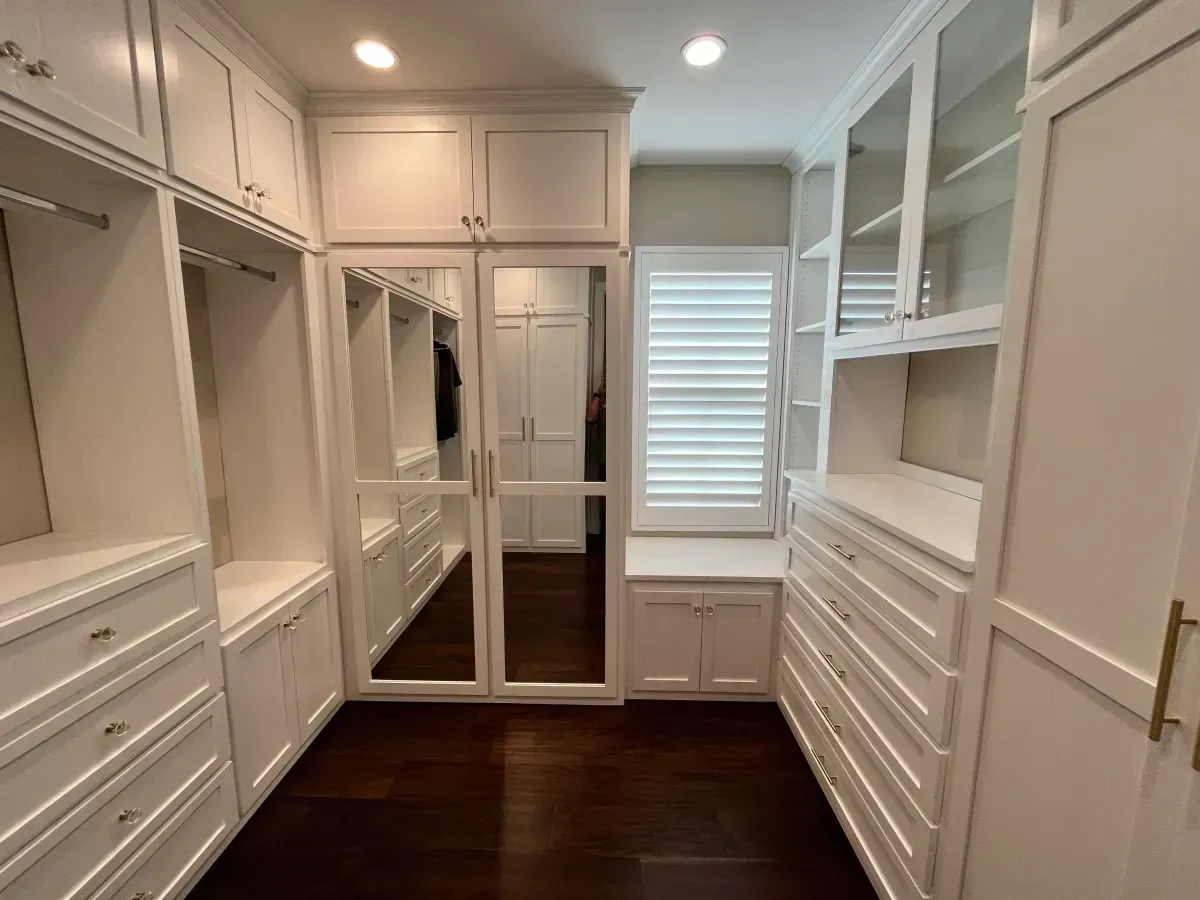 Walk-in dressing room by G & L Cabinets